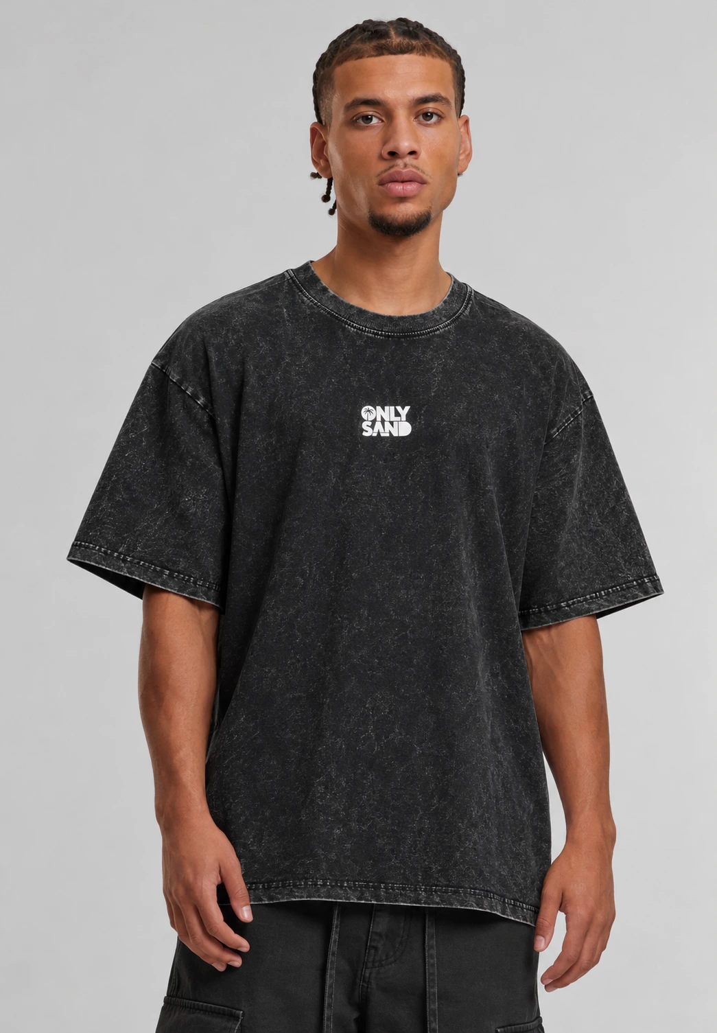 Front view of the BEACH STREET washed charcoal-black T-shirt with a small white ONLY SAND logo.